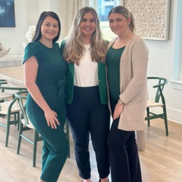 Welcome to Tapestry Park!  Our leasing team is ready to help you find your future apartment home today! Stop by and say hello! three women posing for a photo while hugging each other
