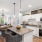 a kitchen with a table and chairs