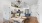 a kitchen with a dining table and chairs