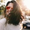 a woman wearing sunglasses