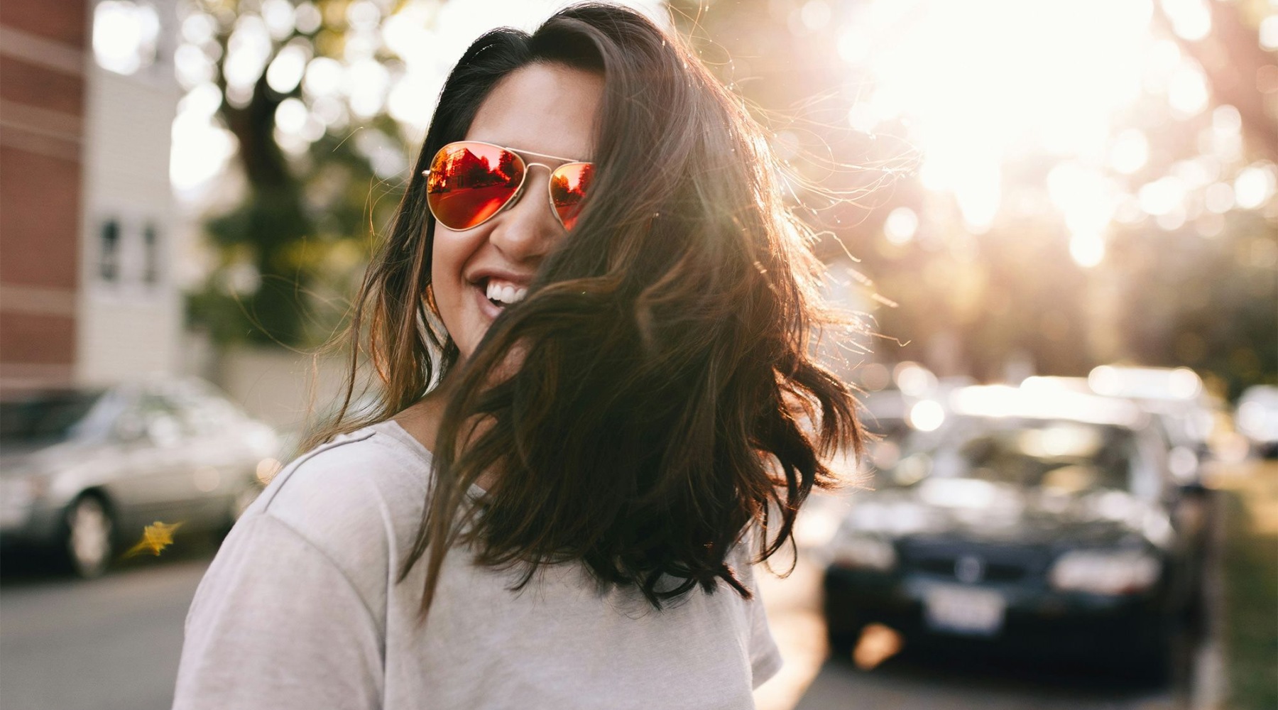 Settle into comfort at Tapestry Park a woman wearing sunglasses