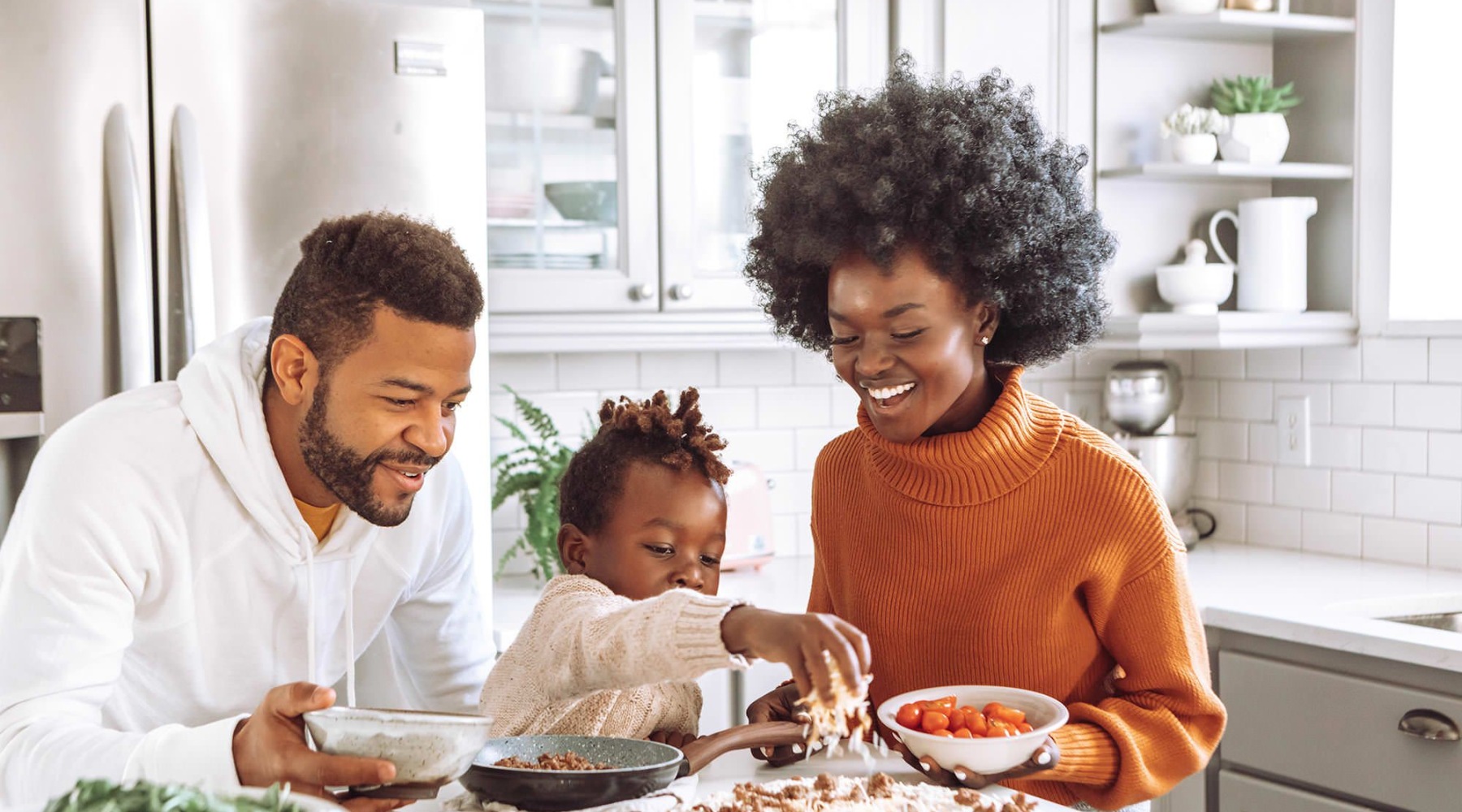 A perfect fit for the whole family a family cooking together